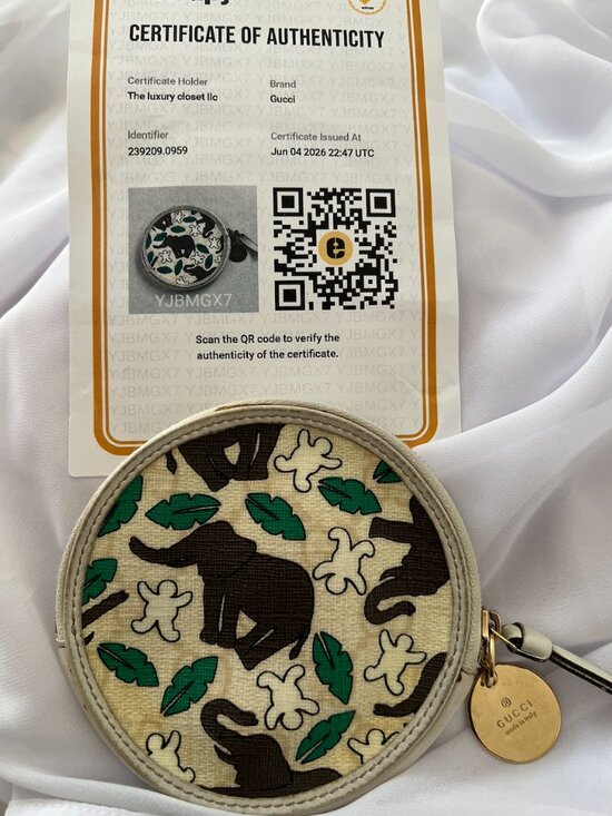 Gucci Handbags - rare Gucci x UNICEF limited edition round coin purse